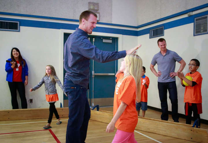 Canucks duo Henrik and Daniel Sedin supporting kids at Sedin Family Foundation