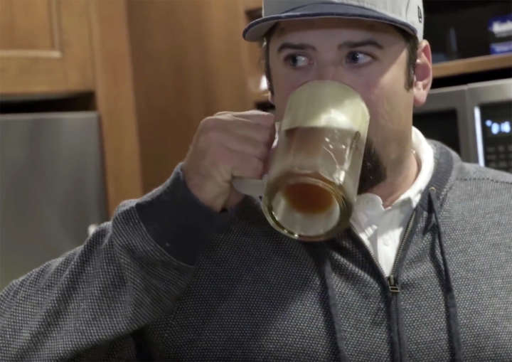 PGA Tour golfer Andres Gonzales drinks a beer