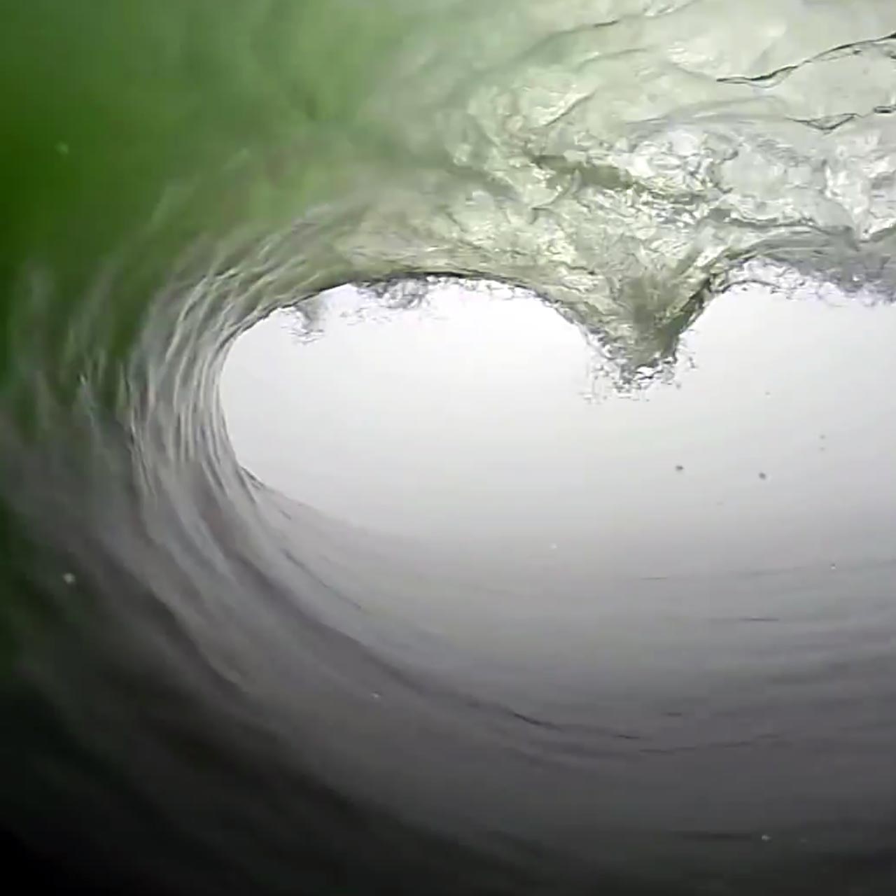 Surfing a wave off the coast of Namibia